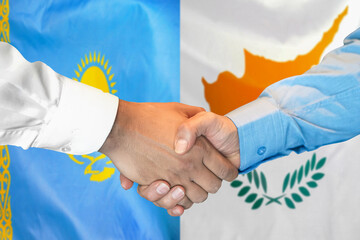 Handshake on Kazakhstan and Cyprus flag background. Support concept
