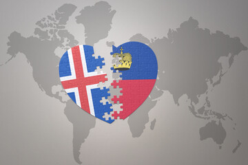 puzzle heart with the national flag of liechtenstein and iceland on a world map background. Concept.