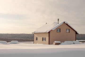 winter landscape rural two-storey brick house