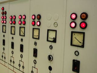 control panel on the wall of a factory
