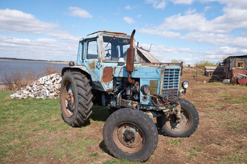 old rural tractor in the Ural outback