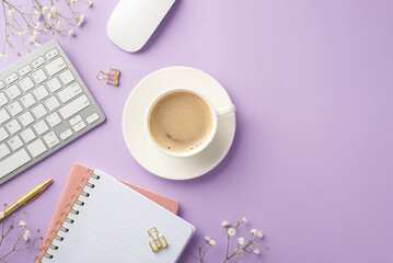 Business concept. Top view photo of workspace keyboard computer mouse cup of coffee on saucer planners gold pen binder clips and white gypsophila flowers on isolated purple background