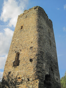 Tower of a medieval castle with sky