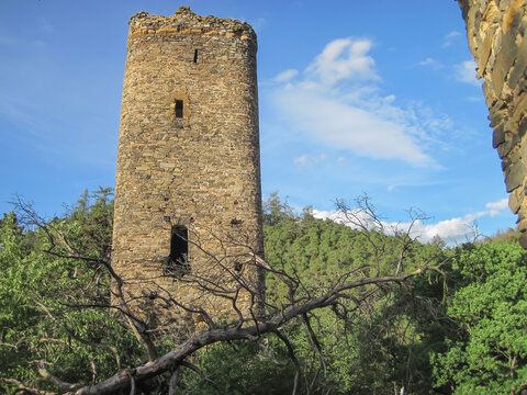 Tower of a medieval castle with sky, ruin
