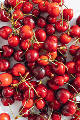 Obraz na płótnie Canvas Fresh Cherries on white background. Healthy food