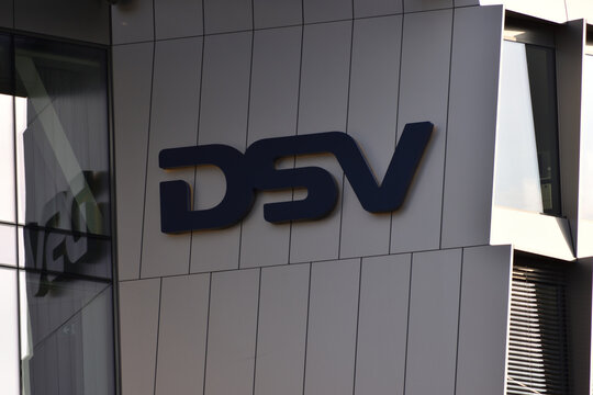 DSV logo, signage on the facade of DSV International Shared Services office, Danish transport and logistics company. WARSAW, POLAND - SEPTEMBER 3, 2021