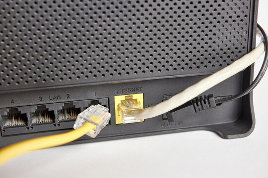 A network cable for connecting to the Internet is connected to the router.