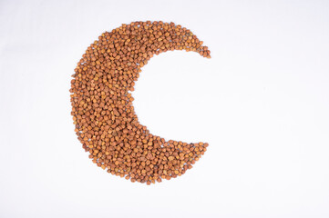 chickpeas (Bengal Gram) on white background. Close up of Organic chana or chickpea (Cicer arietinum). for design and banner. top view chickpeas. Half round. Eid design for graphic. Half moon.