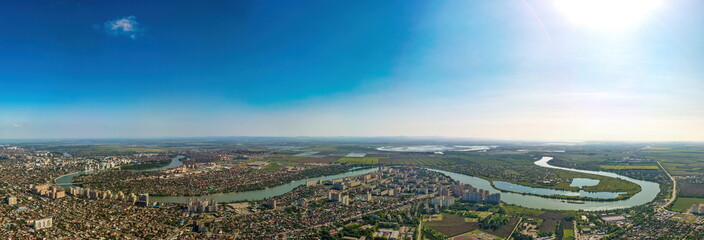 aerial panorama view of the Kuban river and lake near the western outskirts of the city of Krasnodar (South of Russia) in a summer evening day - obrazy, fototapety, plakaty