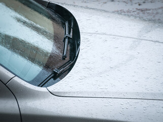 car windshield windscreen and wipers at rain shower