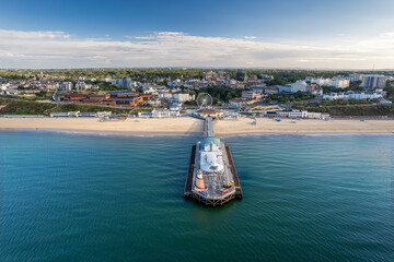 The drone aerial view  of the Bournemouth beach, Observation Wheel and Pier. Bournemouth is a...