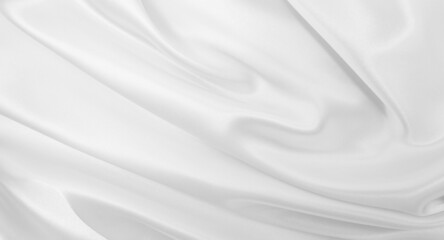 Fototapeta na wymiar Smooth elegant white silk or satin luxury cloth texture as wedding background. Luxurious background design