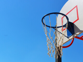 Naklejka premium basketball basket for sports games against the sky