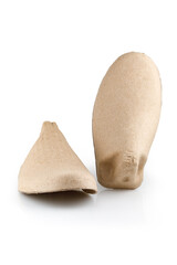 Pair of shoe tree made from recycled cardboard paper isolated on white background, device that used for placed inside a shoe to preserve its shape.