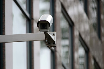 CCTV - security camera, office building in background