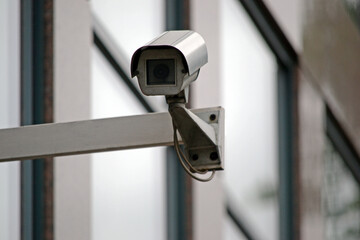CCTV - security camera, office building in background