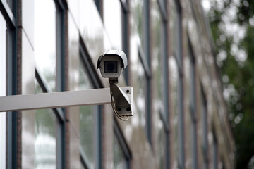 CCTV - security camera, office building in background
