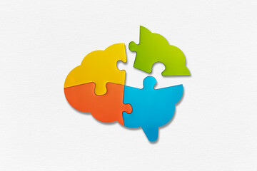 Brain shaped jigsaw puzzle on white background. Missing piece of the brain puzzle, mental health...