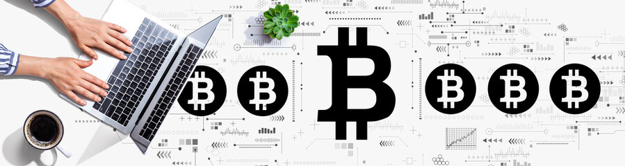 Bitcoin theme with person using a laptop computer