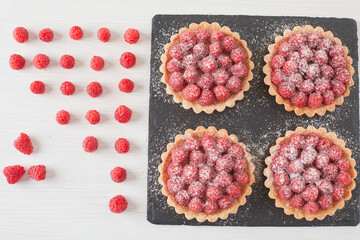 dessert with raspberries on a light background