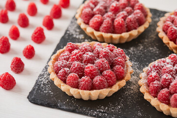 dessert with raspberries on a light background