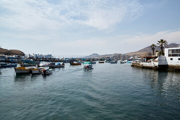 Fototapeta na wymiar The district of Pucusana is one of the 43 districts of the province of Lima, located in the homonymous department, in Peru. It is a fishermen's cove and spa that is located 58 km south of Lima and 7 k