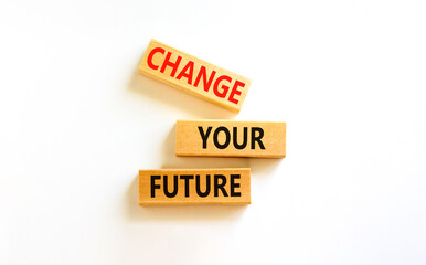 Change your future symbol. Concept words Change your future on wooden blocks on a beautiful white table white background. Business, finacial and change your future concept. Copy space.