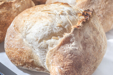 Traditional Italian bread on a shelf with natural light,handmade bread