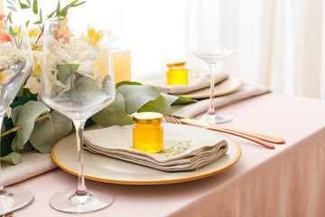 Honey bonbonnieres on served for wedding table
