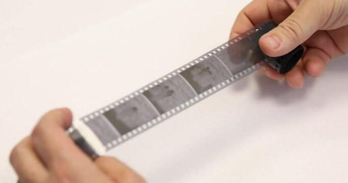 Viewing in the hands of an old photographic film.