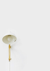 Modern floor lamp with glass shade against a white background. Minimalist composition with copy space.