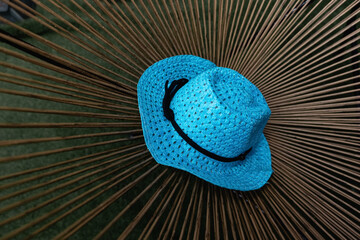 Blue woven hat isolated on white background