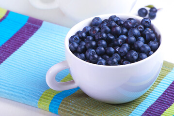 White plate with blueberries