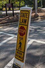 State Law stop for pedestrians sign