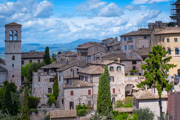 Fototapeta na wymiar Panorama of the ancient houses of the city of Assisi (Umbria Region, central Italy). Is world famous as birthplace of St. Francis, Italy's christian Patron.