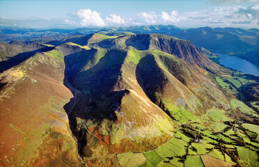 Southeast over Grasmoor Fells from Lorton Vale near Crummock Water, Lake District National Park, Cumbria, England UK. Aerial.