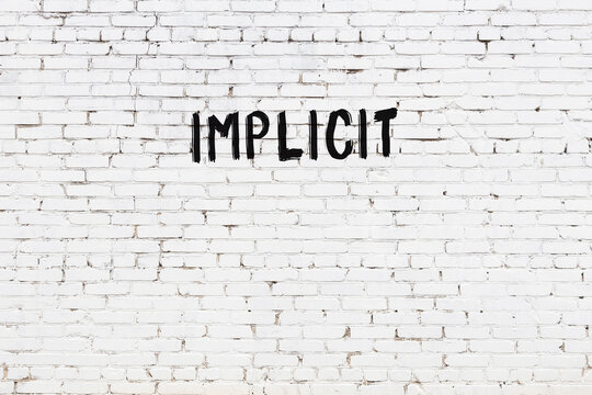 White wall with black paint inscription implicit on it