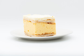 Freshly made vanilla slice with creamy custard, fluffy puff pastry and buttercream icing.