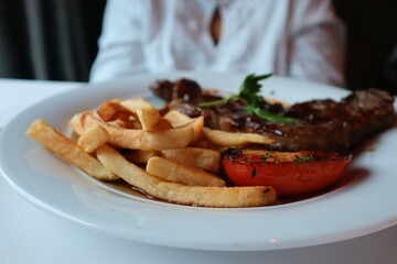 grilled steak with fries