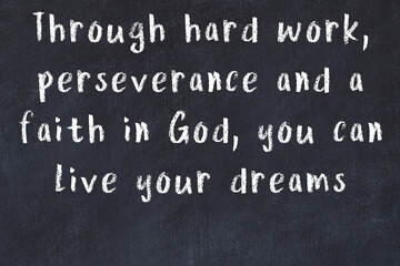 Chalk wise inscription on black chalkboard