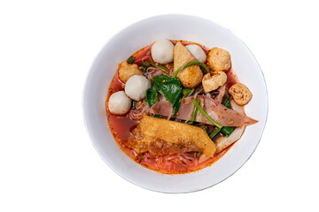 Traditional yentafo thin rice stick noodles with pink sauce and fish balls, shrimp ball, crisp...