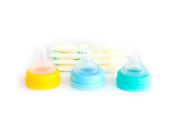 Stock of breast milk and pacifier on white - 508351818