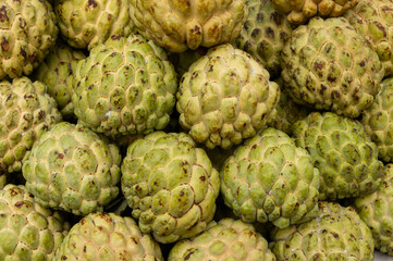 Custard apple fruits, Annona reticulata, are on display for sale at New Market area, Kolkata, West Bengal, India.