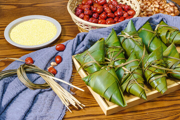 Chinese traditional festival Dragon Boat Festival, Zongzi and ingredients on the table