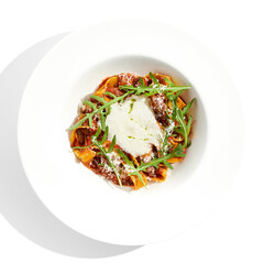 Italian pasta pappardelle with bolognese sauce  and parmesan isolated on white background. Pasta tagliatelle with meat ragu and creamy espuma with arugula. Minced beef in tomato sauce with pasta.