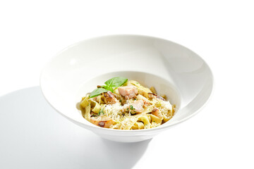 Traditional Italian lunch - pasta fettuccine with chicken and mushrooms with parmesan cheese. Creamy pasta with mushroom and chicken. Chicken and mushroom in cream sauce with homemade pasta.