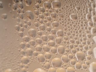 Water drops background texture. Backdrop glass covered with drops of water. bubbles in water