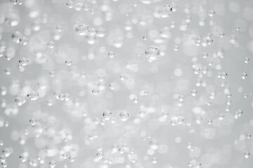 Water bubbles or carbonate drink close up motion abstract background