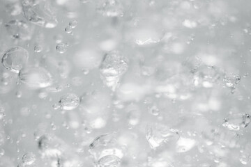 Water bubbles or carbonate drink close up motion abstract background