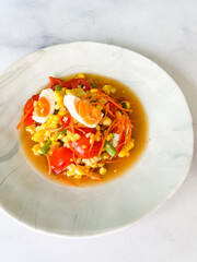 Som Tum - Thai spicy papaya salad with corn - Asian food style